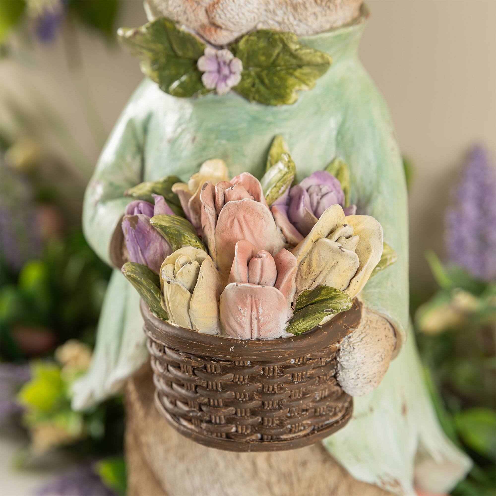 Glitzhome® 15.75" Easter Resin Bunny Boy with Flowers Table Decor